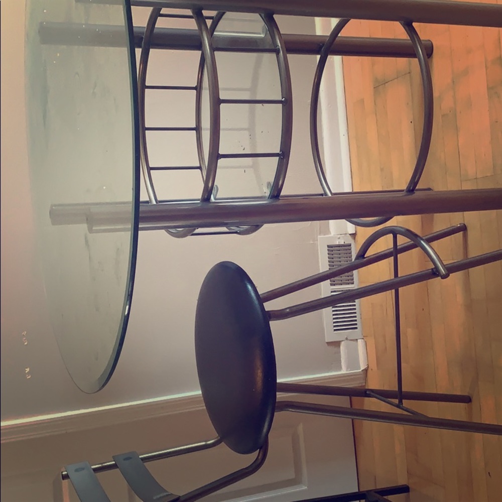 Tall glass bar table and 3 chairs to go with.